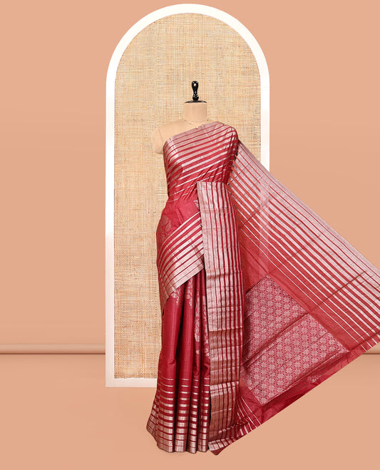 Borderless Red Tussar Silk Saree, Elegantly Framed with Zari Stripes and Floral Buttas, Striped Pallu, and a Matching Blouse
