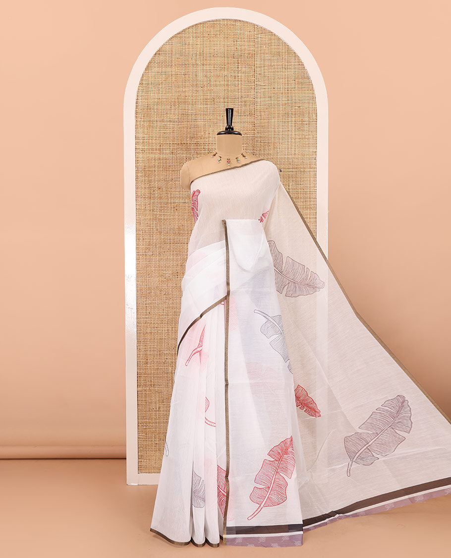 Borderless white big banana leaf motifs printed chanderi cotton saree, printed pallu, and contrast printed blouse