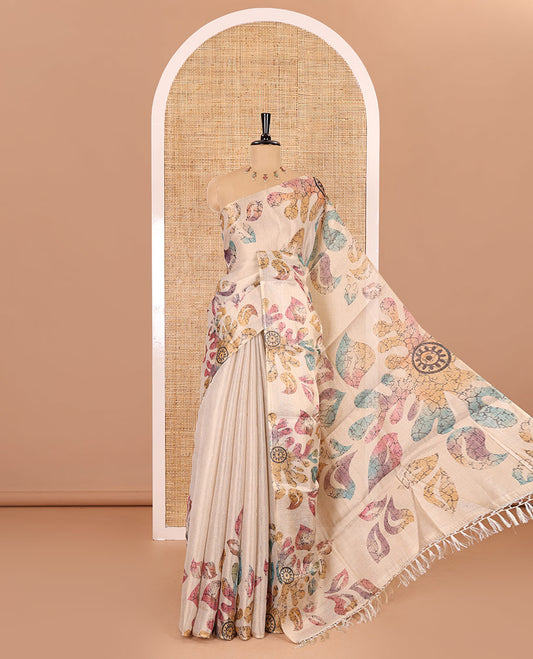 Borderless cream base multi-color abstract floral printed tissue saree, abstract printed pallu and a matching motifs printed blouse