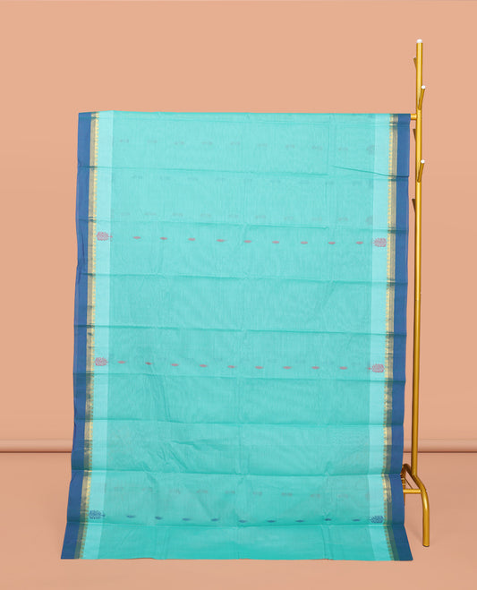 Blue Kanchi Cotton Saree, Decorated with Buttas All Over Its Body, Complemented by a Contrast Border, Pallu of Paisley Design, and Paired with a Matching Blouse