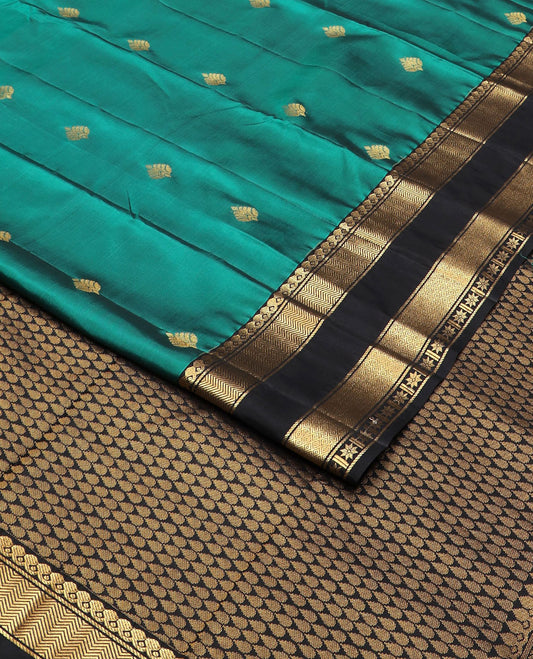 Green zari buttas vasundhara silk mix saree, contrast thilakam motif pallu & rettai pettu border of salngai,vanki,mayil kann & star kamalam
