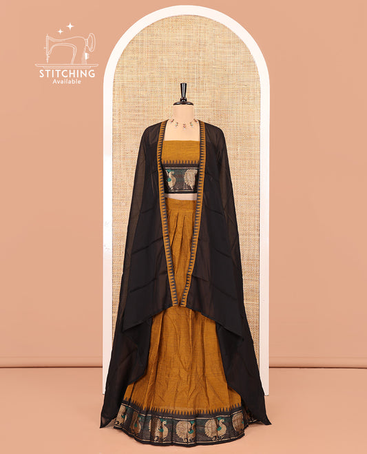 Mustard-Black Chettinad Cotton Half-Saree Set Featuring a Plain Skirt, Contrast Temple Peacock Motif Border, a Matching Blouse, and a Contrast Temple Dhavani