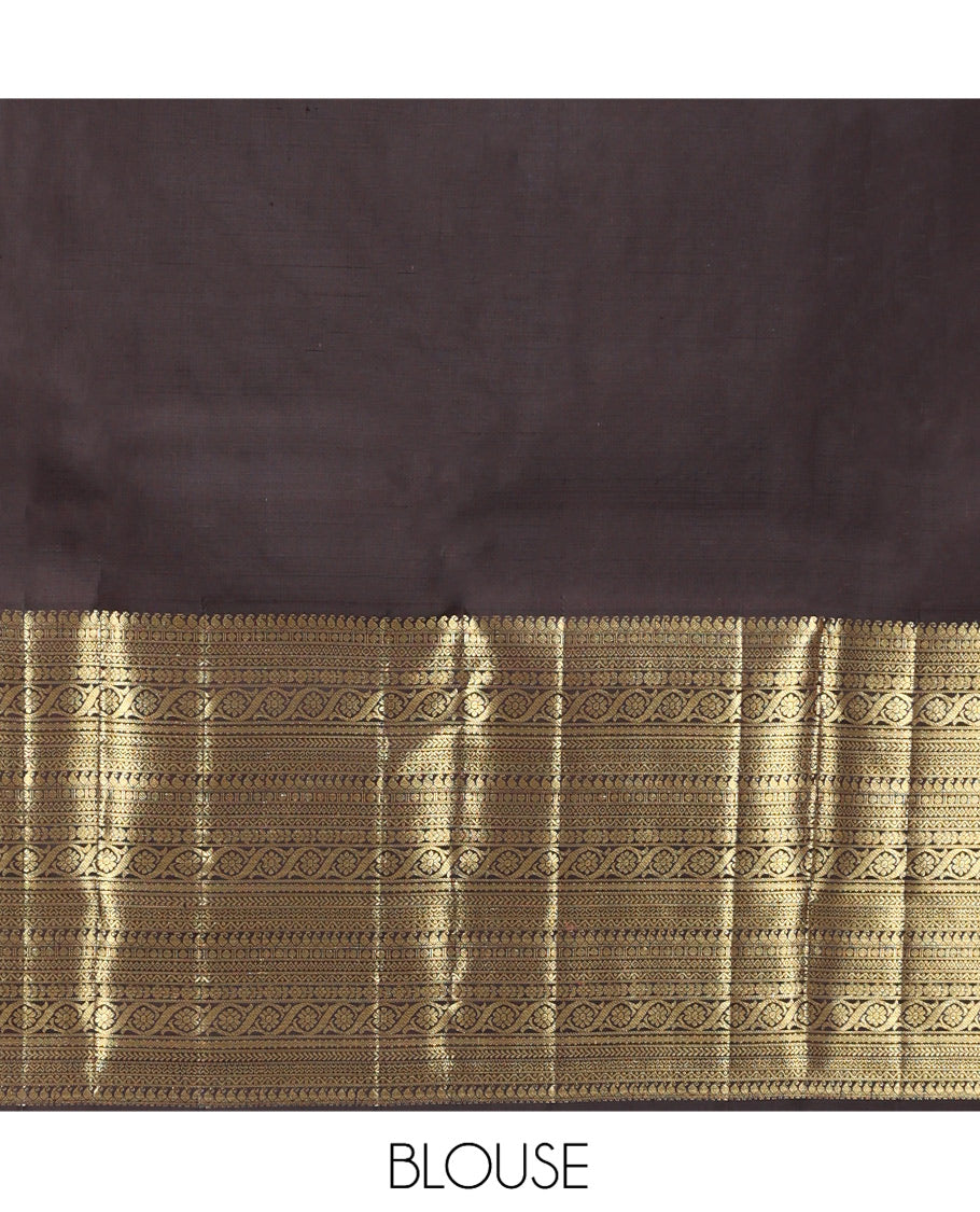 Brown Kanchipuram Silk Saree, Elevated with Zari Buttas, Highlighted by Zari Border of Manga, Paisa, Diamond, Neli, Cross Kamalam, Kathir, and Cross Neli, Jaal Pallu, and a Matching Blouse