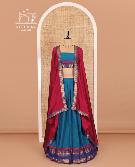 Blue-majenta sungudi cotton saree, striped with contrast rettai pettu traditional zari bordered skirt, a matching blouse, and a zari bordered dhavani