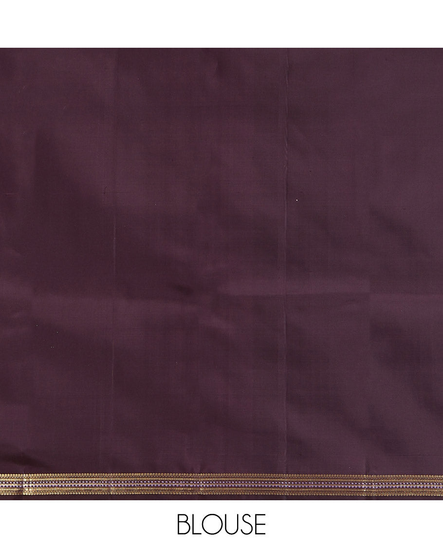 Brown Kanchipuram Silk Saree, Delicately Woven with Zari Buttas All Over Its Body, Highlighted by a Zari Border of Salngai, Muthu, and Rekku Designs, Pallu of Intricate Designs, and Paired with a Matching Blouse