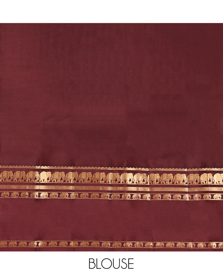 Peach Vasundhara Silk Saree, Adorned with Zari Buttas All Over Its Body, Complemented by a Contrast Rettai Pettu Border of Yaanai Designs, Grand Jaal Pallu, and Paired with a Contrast Blouse