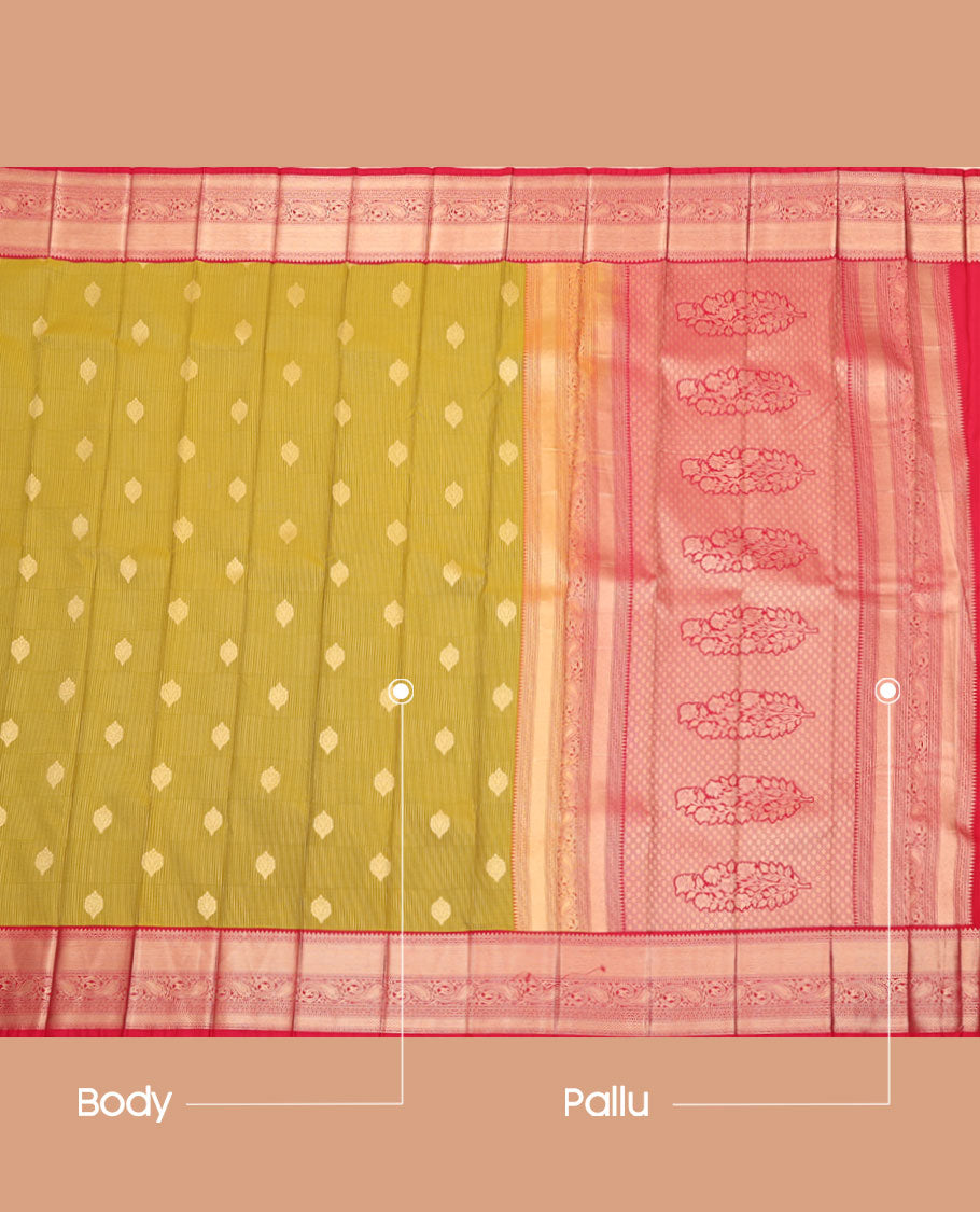 Green Budget Silk Saree, Beautifully Bedecked with Buttas All Over Its Body, Complemented by a Contrast Traditional Zari Border of Paisley Designs, Grandly Detailed Pallu, and Paired with a Contrast Blouse