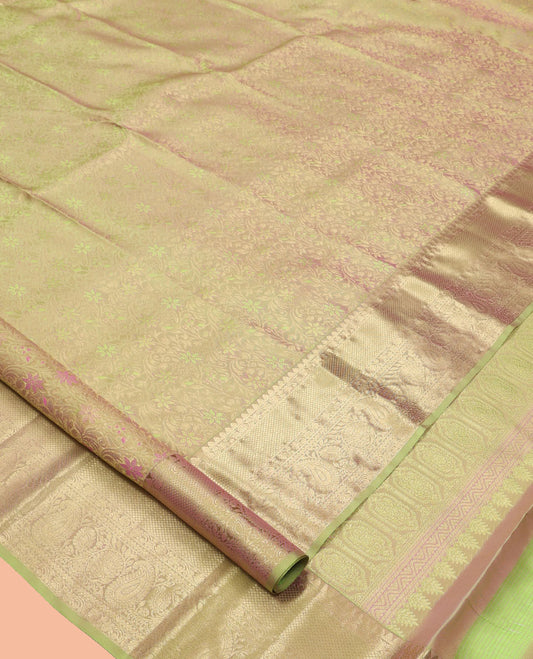 Green Kanchipuram Wedding Silk Saree, Detailed with Jacquard Design, a Zari Border of Thilakam, Mayil Kann, Kodi Visiry, Neli, and Manga Designs, Jaal Pallu, and a Matching Blouse