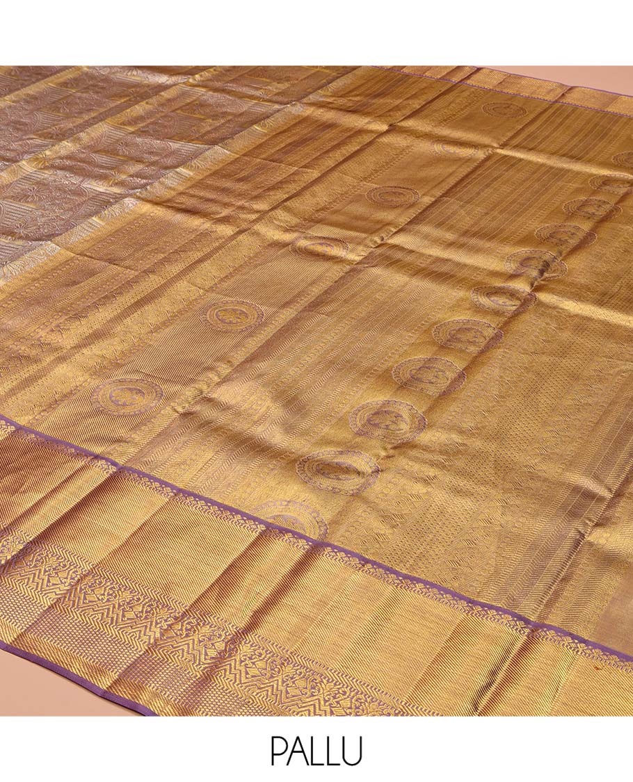 Grey-Gold Kanchipuram Tissue Silk Saree, Richly Detailed with Jacquard Design On Its Body, Complemented by Contrast Traditional Zari Designs Woven Border, Grandly Zari Designed Pallu and Paired with a Contrast Blouse