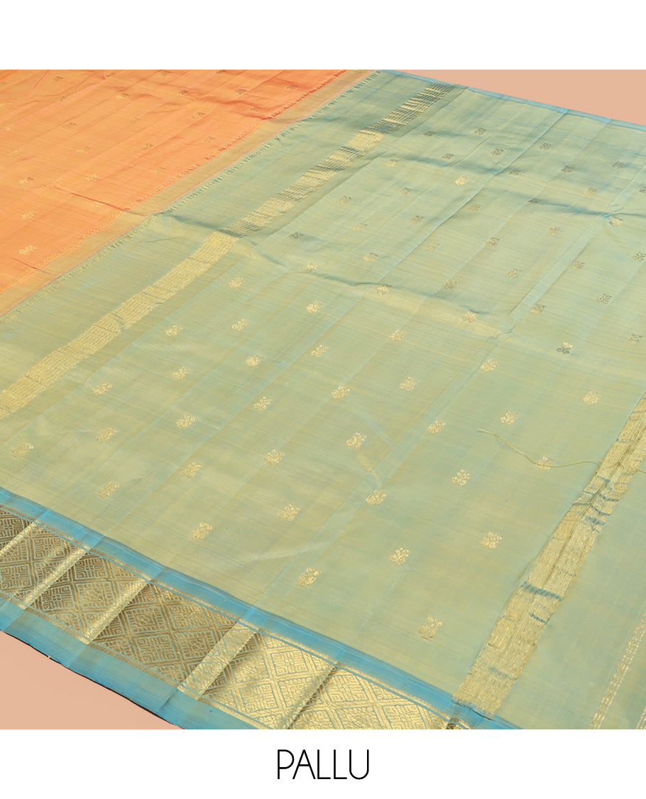 Orange Kanchipuram Silk Saree, Accentuated with Zari Buttas, a Contrast One-Sided Border of Banaras and Jaal Design, Zari Design Pallu, and No Blouse