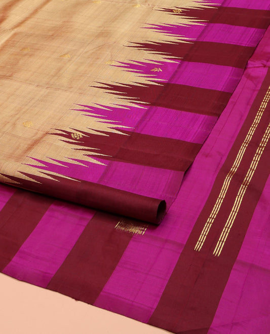 Sandal Kanchipuram Silk Saree, Elevated with Zari Buttas on Its Body, Complemented by a Contrast One-Sided Thazampoo Rekku Border of Zari Buttas, Pallu Steeped with Zari Designs, and Comes Without a Blouse