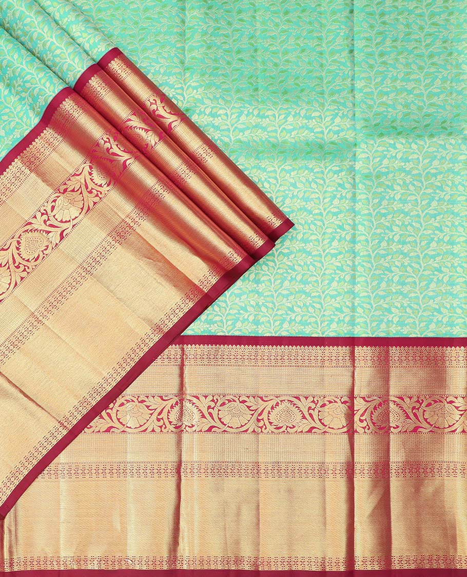 Green floral jacquard pure half silk saree with contrast zari border,  contrast zari design blouse & plain with zari border dhavani