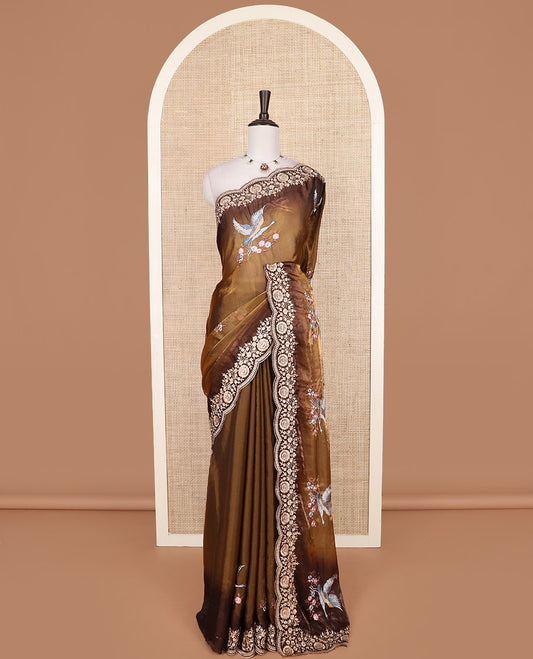 Brown crane and floral motifs thread embroidered designer saree, scallop floral thread embroidered border, and embroidered pallu