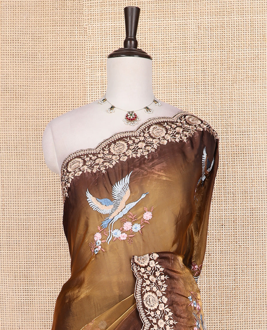Brown crane and floral motifs thread embroidered designer saree, scallop floral thread embroidered border, and embroidered pallu