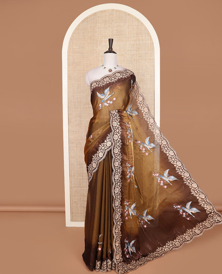 Brown crane and floral motifs thread embroidered designer saree, scallop floral thread embroidered border, and embroidered pallu