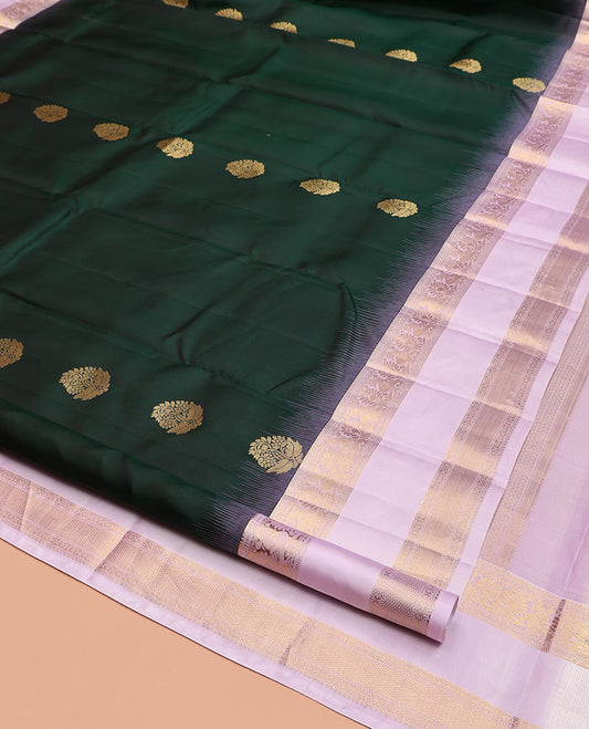 Green Vasundhara Silk Saree, Adorned with Zari Buttas, Contrast Rettai Pettu Border of Mayil, Muthu, Kamalam, and Mayil Kann Designs, Grand Pallu, and Contrast Blouse