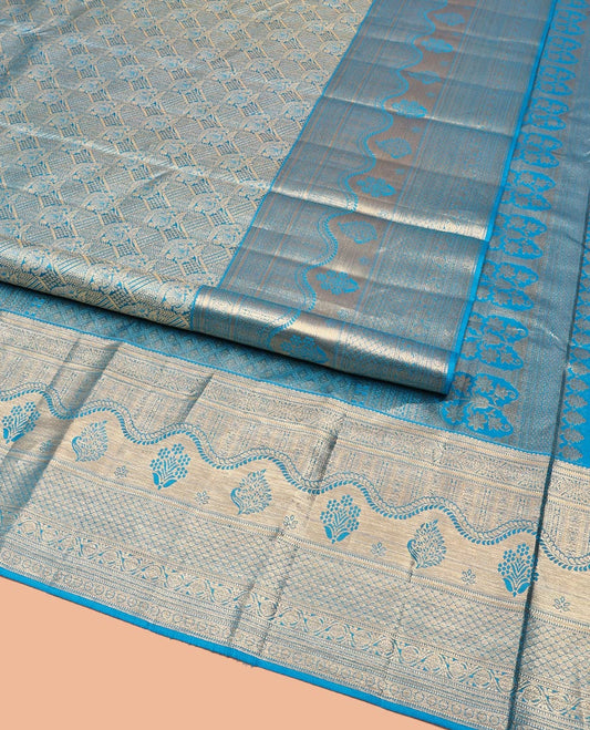 Blue Kanchipuram Wedding Silk Saree, Prettified with Jacquard Designs on Its Body, Highlighted by a Zari Border of Geometric Designs, Grand Jaal Patterned Pallu, and Paired with a Matching Blouse
