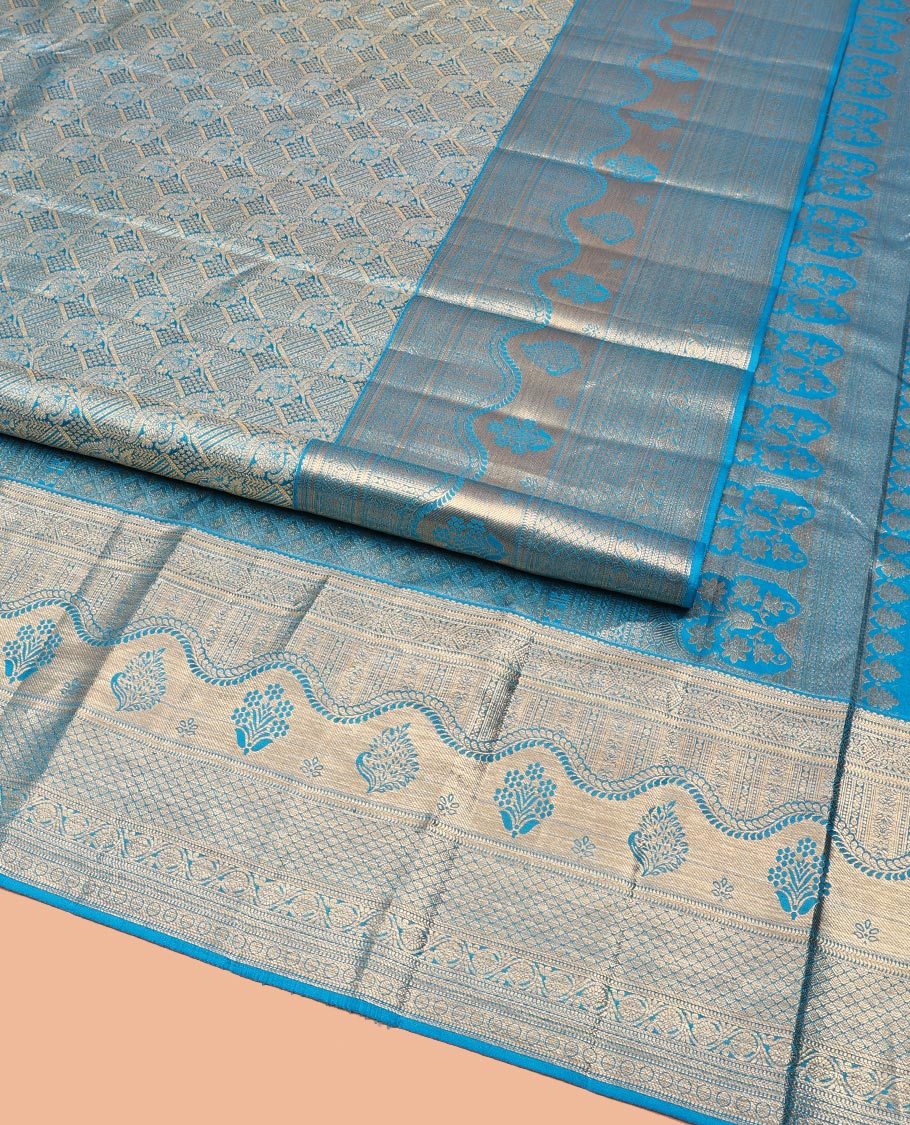 Blue Kanchipuram Wedding Silk Saree, Prettified with Jacquard Designs on Its Body, Highlighted by a Zari Border of Geometric Designs, Grand Jaal Patterned Pallu, and Paired with a Matching Blouse