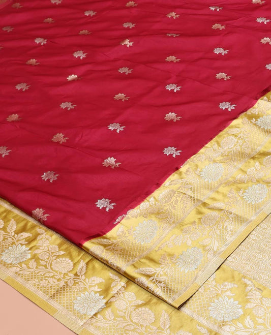 Maroon Mushuru Silk Saree, Elevated with Zari Buttas All Over Its Body, Complemented by Captivating Contrast Border of Floral Jaal Designs, Grandly Decked Up Pallu and Paired with a Contrast Blouse