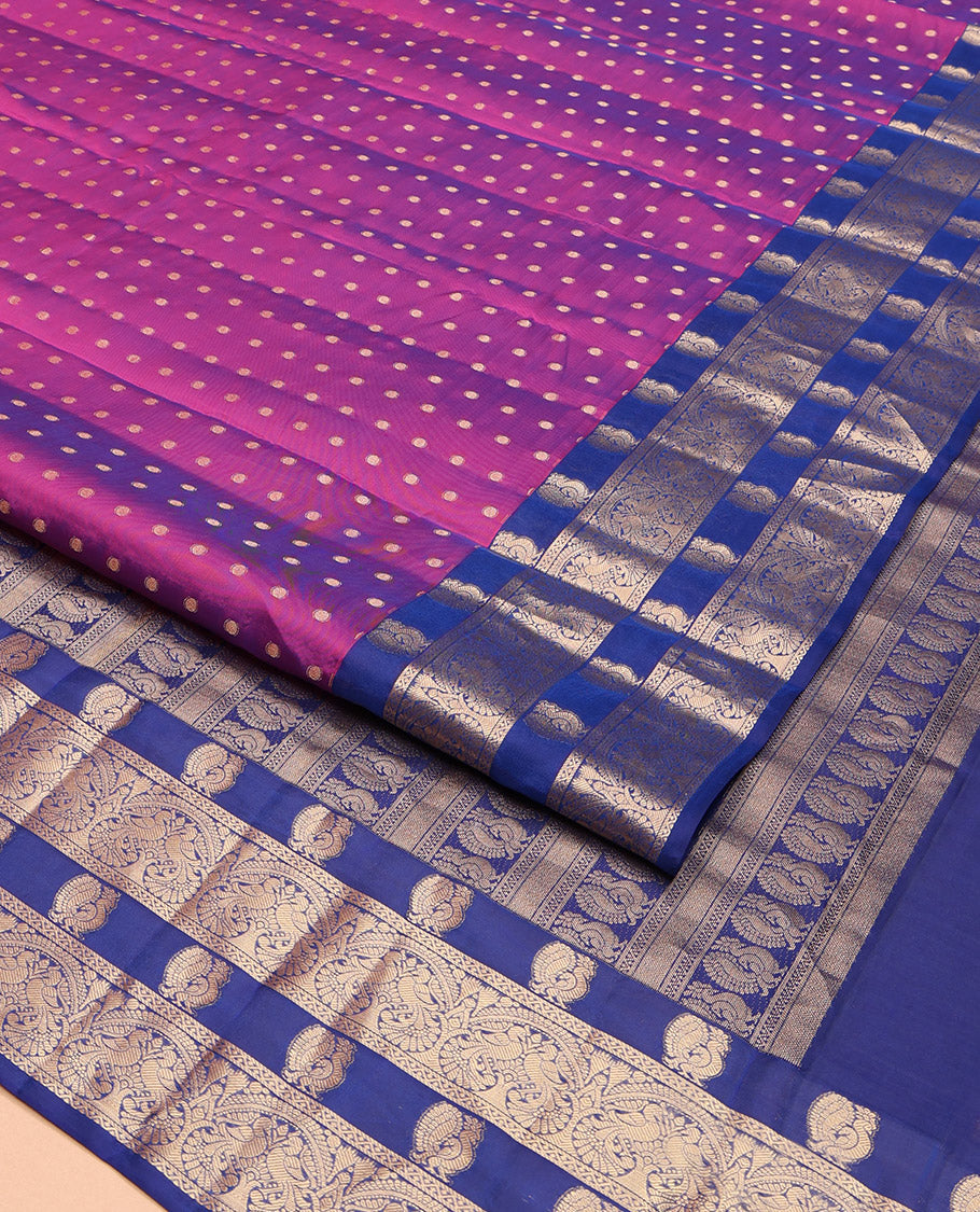 Purple Vasundhara Lite-Silk Mix Saree, Decorated with Buttas All Over Its Body, Complemented by a Contrast Border Steeped with Mayil Designs, Grandly Pallu of Mayil Designs, and Paired with a Contrast Blouse