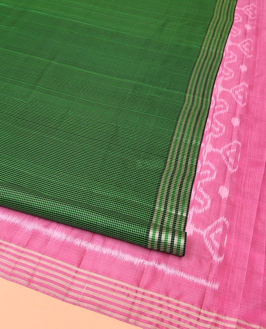 Green and Black Mayuri Soft Silk Saree, Subtly Sparkled with Kasa-Kasa Checks All Over Its Body, Highlighted by Zari Striped Border, Delicately Woven Pallu of Ikkat Texture, and Paired with a Contrast Blouse