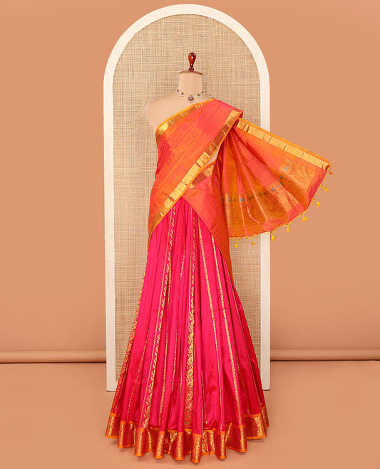 Pink Pure Silk Half-Saree Embellished with Manga Designs on Its Skirt, Complemented by a Contrast Border Zari Designs, Comes with a Contrast Blouse and a Dhavani of Mang and Leaf Designs