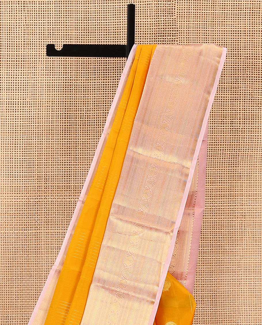 Orange Vasundhara Lite Silk Mix Saree Enhanced with Round Mayil Buttas, Featuring a Contrast Maroon Border of Neli, Kathir, Manga, and Mayil Kann, Pallu Elevated with Zari Designs, and a Contrast Border