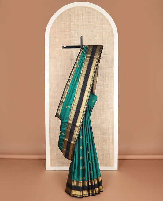 Green zari buttas vasundhara silk mix saree, contrast thilakam motif pallu & rettai pettu border of salngai,vanki,mayil kann & star kamalam