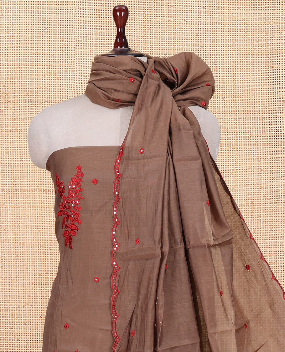 Brown-Red Mul Chanderi Material Churidar Features Floral Embroidered Top, a Matching Bottom, and an Embroidered Scallop Dupatta