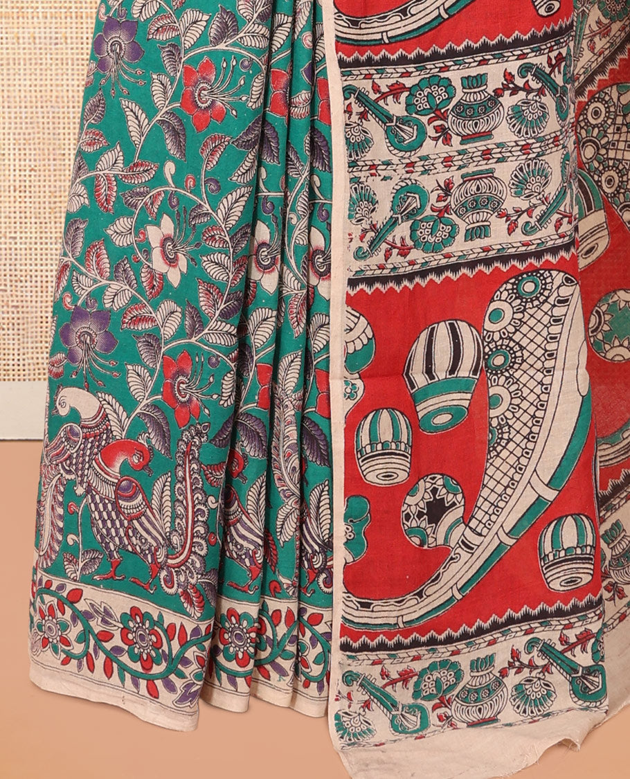 Blue Kalamkari Cotton Saree, Adorned with Floral Vine Print, Contrast Printed Border, Kalamkari Musical Instrument Motifs Pallu, and a Contrast Blouse