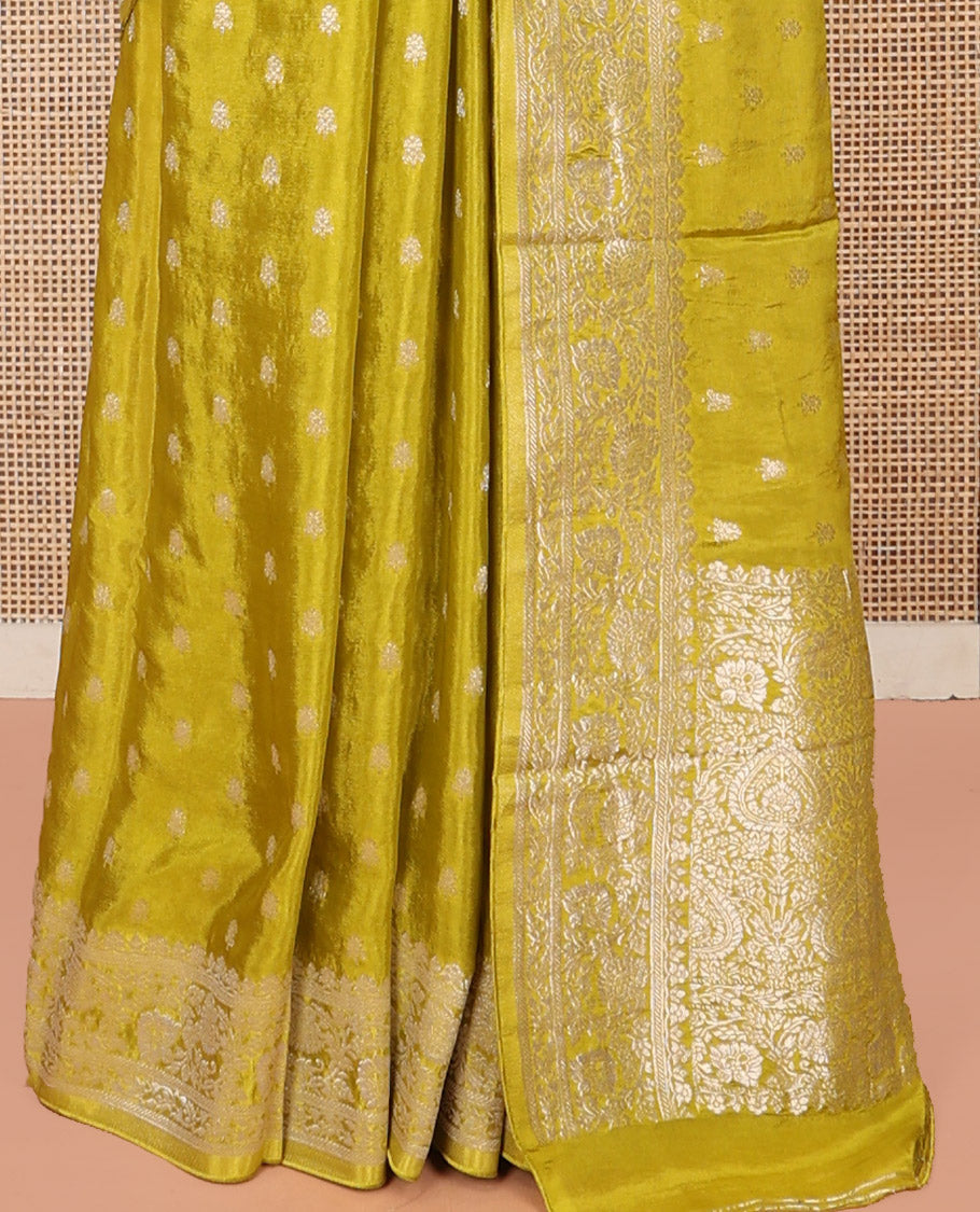 Green Fancy Crepe Saree, Finely Crafted with Buttas, Highlighted by a Floral Creeper Border, Intricately Designed Pallu, and a Matching Blouse