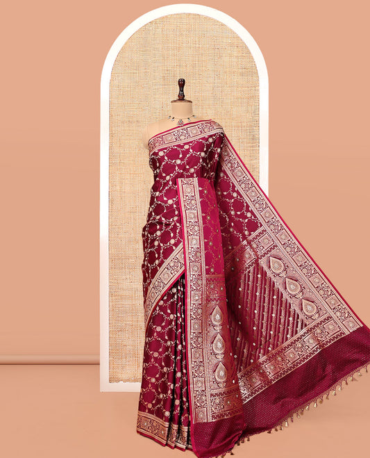 Rani Pink Wine Banarasi Satin Saree, Decked Up with Floral Jaal Jacquard, a Floral Creeper Border, Intricate Stonework Pallu, and a Matching Blouse