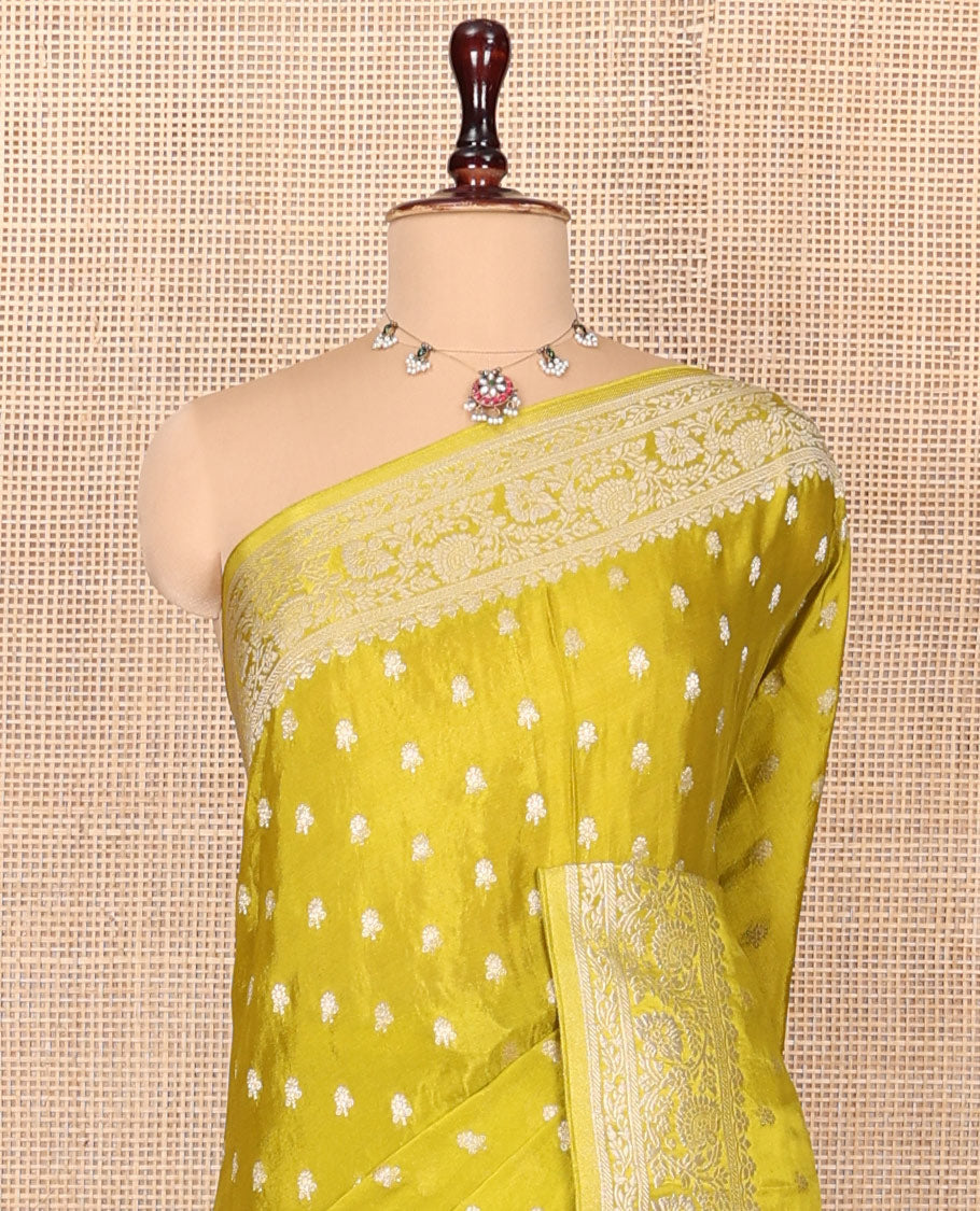 Green Fancy Crepe Saree, Finely Crafted with Buttas, Highlighted by a Floral Creeper Border, Intricately Designed Pallu, and a Matching Blouse