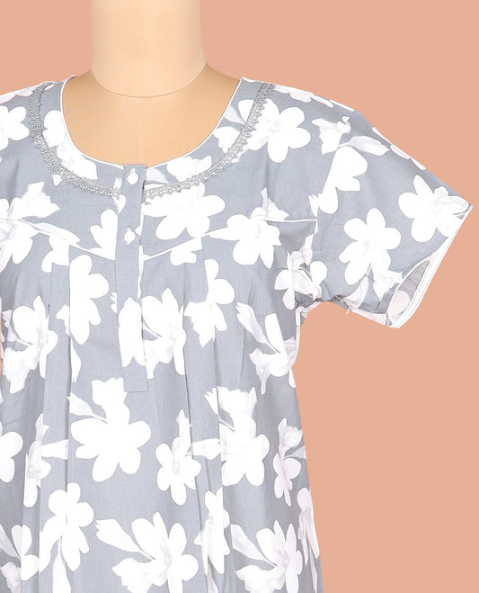 Grey Cotton Nighty Delicately Decked up with Silhouette Floral Motifs Print, Featuring Lace Work, Round Front Neck, and Half Sleeves