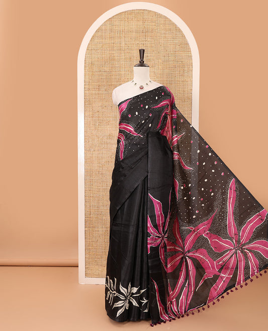 Black-base plain body khadi cotton saree with batik-style pink-color floral & dots printed on its border & pallu, plain black blouse