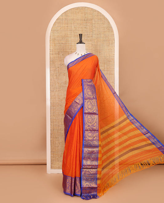 Orange plain design mercerised cotton saree, contrast traditional peacock enclosed manga border, striped pallu & matching blouse