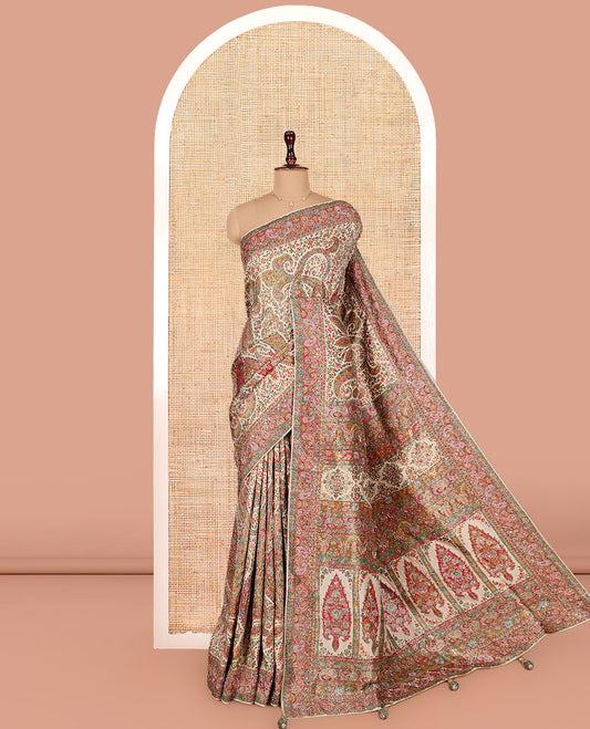 Multi-Color Dola Silk Saree, Masterfully Printed with Colorful Floral-Paisley Design on Its Body, Complemented by Contrast Print and Embroidery Border, Intricately Designed Pallu, and Paired with a Matching Blouse