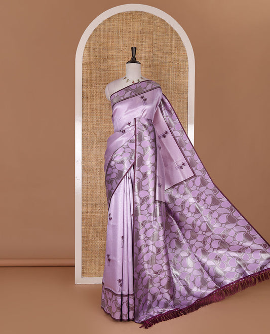 Purple jacquard kanchi silk saree, contrast border, and pallu steeped with paisley motifs with contrast zari design blouse