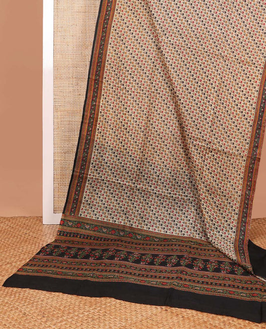 Pale brown leaf design printed silk saree with contrast floral design border & floral design pallu