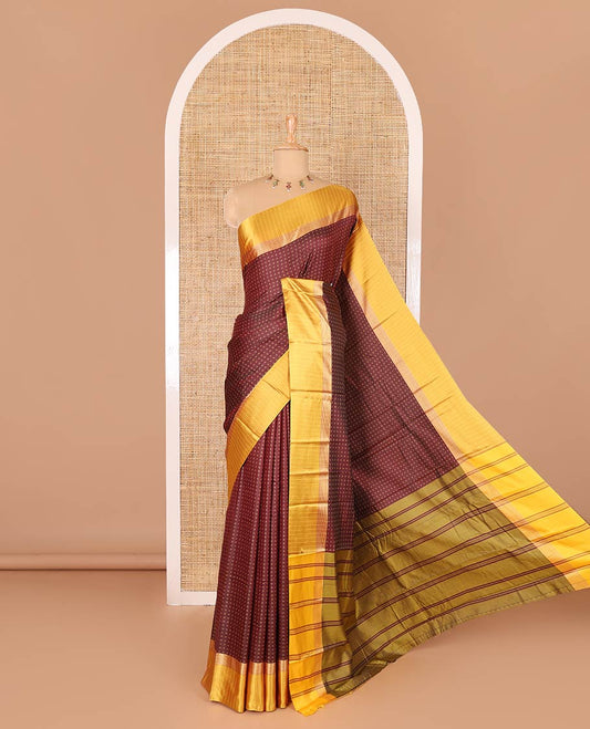 Maroon thread plus buttas semi-soft silk saree, contrast striped satin border, striped pallu, and contrast plus buttas blouse