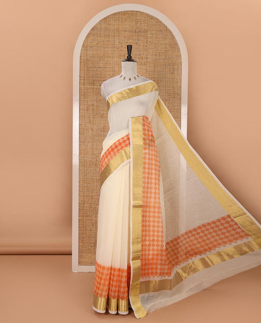 Cream with orange kerala cotton saree , diamond style printed with gold zari tissue bawanchi border & diamond design printed pallu with plain blouse