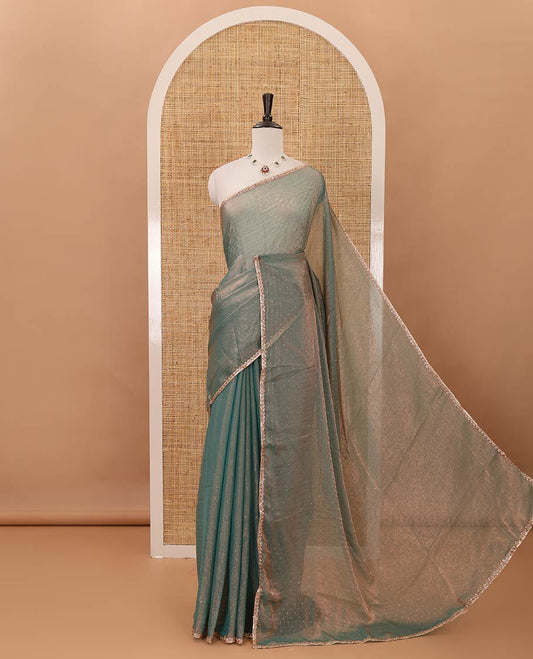 Blue Swarovski stone work embedded fendy-chiffon saree, scallop lace border & floral mixed embroidered blouse