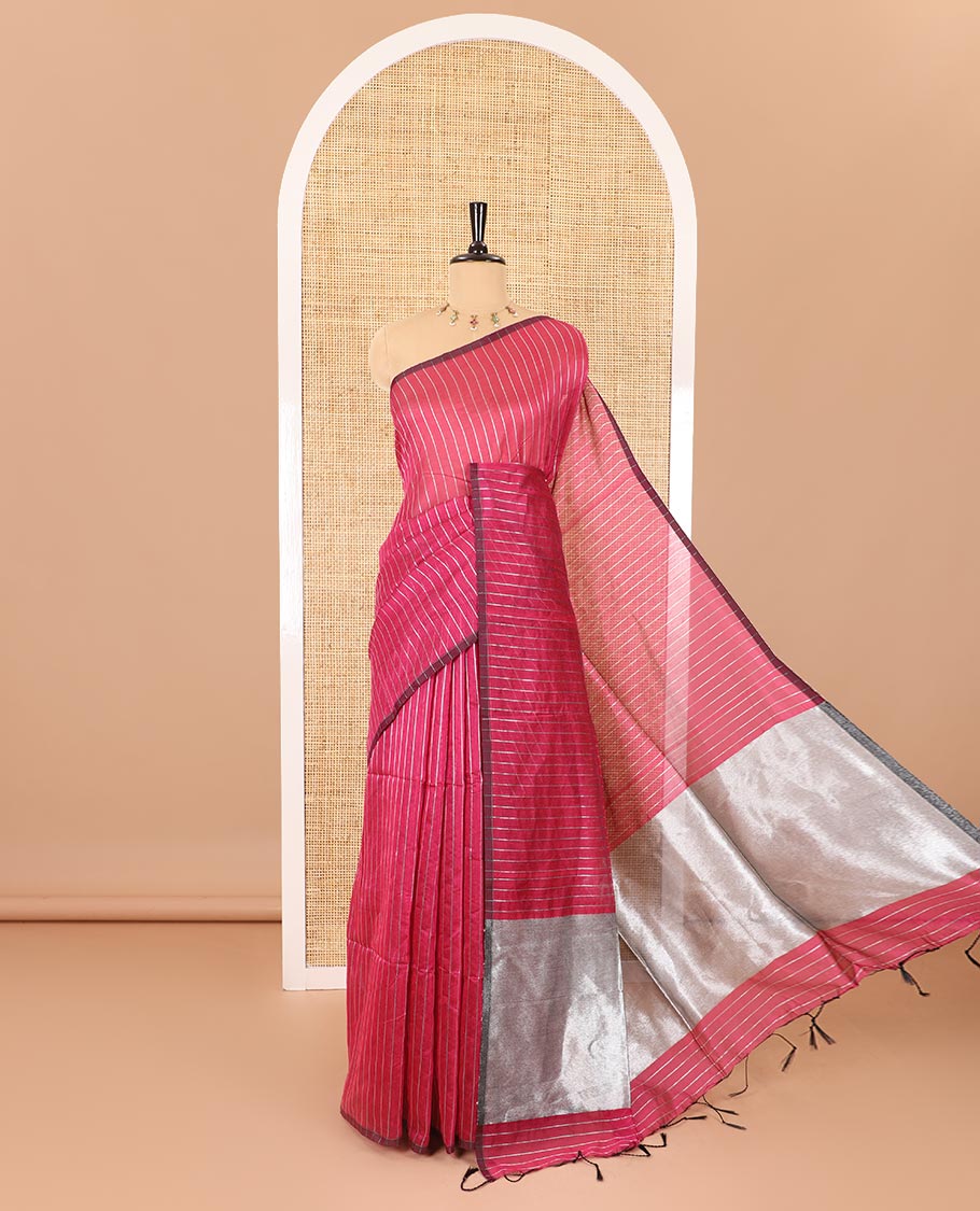 Borderless rani pink silver zari vertically striped khadi mul cotton saree, gleaming zari pallu and a matching blouse