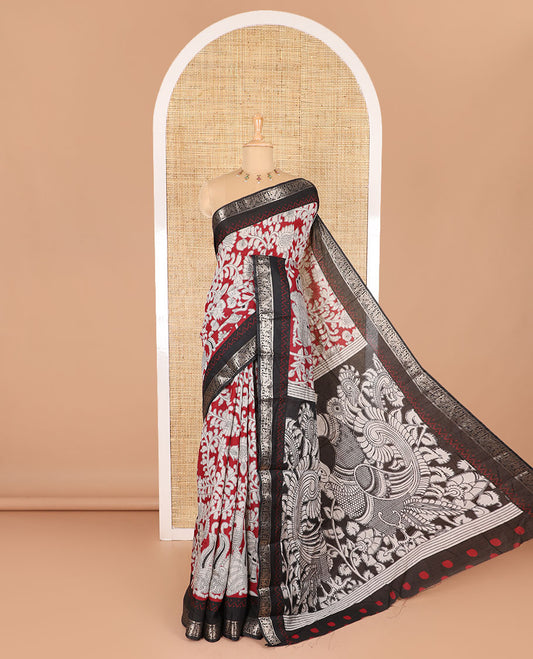 Maroon kalamkari floral vine and peacock printed muslin cotton saree, contrast zari border, kalamkari peacock printed pallu, and a contrast coin buttas printed blouse