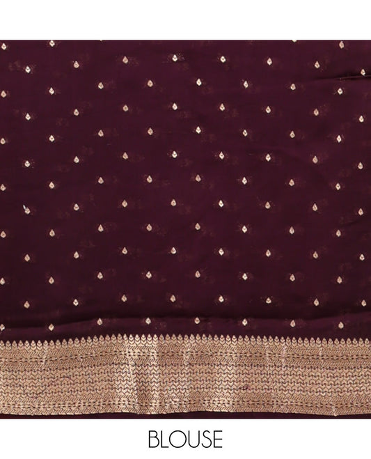 Cherry red animal print mushru silk saree with bawanchi border & rich pallu along with butta design blouse