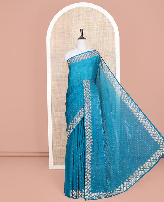 Blue Designer Saree, Prettified with Stone Work Across Its Body, Highlighted by a Stone Embroidered Border, a Self Pallu, and Paired with a Matching Stone Work Blouse