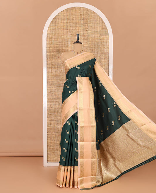 Bottle green buttas soft silk saree , contrast peacock and mango zari weaving border , contrast weaving rich pallu and contrast Blouse