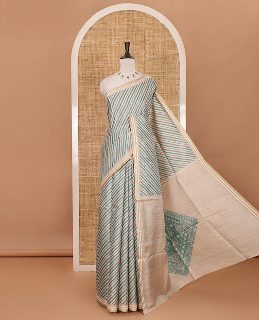 Peacock green lehariya-style striped semi-tussar saree, contrast resham thread triangle motifs border, diamond printed pallu & contrast printed blouse