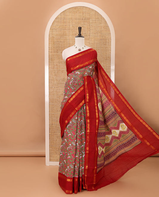 Green lotus design printed sungudi cotton saree, contrast rettai pettu zari border, geometric pallu & running blouse