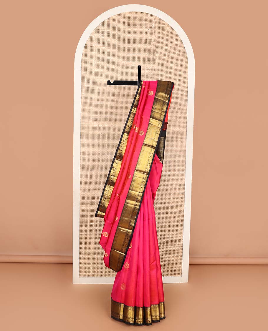 Pink zari buttas Kanchipuram korvai silk saree, contrast neer korvai border of rekku, muthu, laddu kamalam, neli, myil, and manga designs, and pallu of laddu kamalam designs